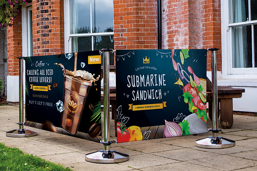 Premium Stainless Steel Adfresco Cafe barrier system situated outside a food retail outlet.