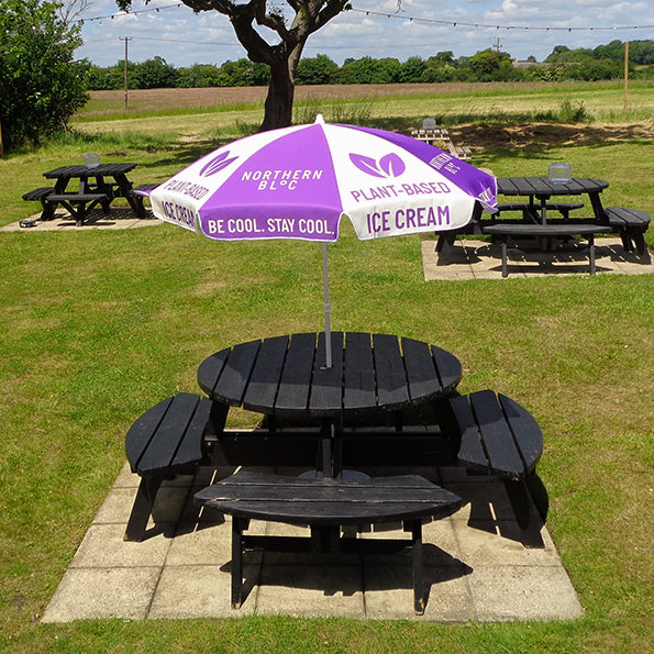 Classic Garden Parasol in pub garden showing Northern Bloc artwork