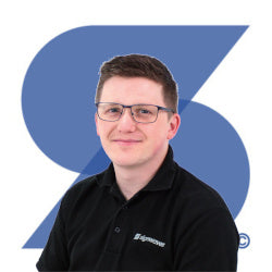 Daniel, Senior Production Artworker at Signwaves Ltd on top of the brand logo