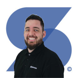 Jon, Print Production Manager at Signwaves Ltd on top of the brand logo