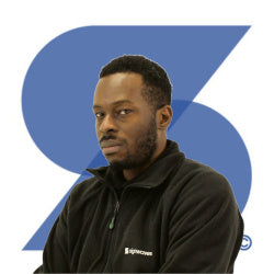 Ren, Production Artworker at Signwaves Ltd on top of the brand logo