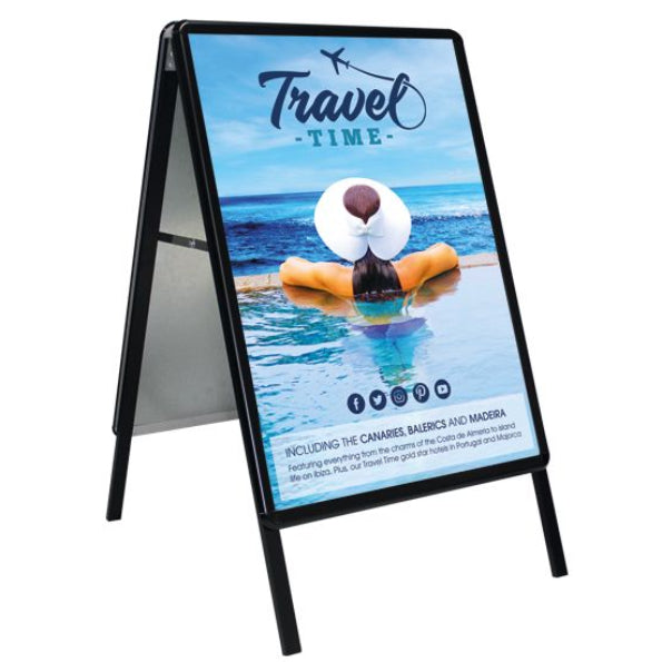 Outdoor advertising board with travel-themed design featuring a person on an inflatable ring.