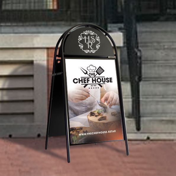 Outdoor sign for The Chef House with a logo and text on a black background